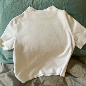 Fitted turtleneck shirt, thick material, good for colder weather